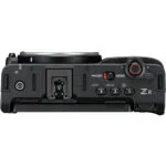 Top view of a professional camera body with control dials and buttons, ideal for photography enthusiasts.