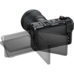 Nikon mirrorless camera with adjustable LCD screen, ideal for photography enthusiasts.