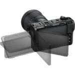 Nikon mirrorless camera with adjustable LCD screen, ideal for photography enthusiasts.