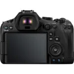 Back view of a professional DSLR camera body with LCD screen and controls.