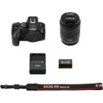 Canon EOS R6 Mark III camera kit with lens, battery, charger, and strap.
