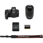 Canon EOS R6 Mark III camera kit with lens, battery, charger, and strap.