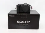 Canon EOS RP mirrorless camera on box, available at UK camera shop.