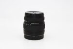 Sigma 18-50mm lens on white background, ideal for DSLR and mirrorless cameras.