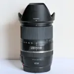 Tamron zoom lens with hood for DSLR cameras, available at Camix UK.