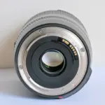 Close-up of a camera lens mount, ideal for DSLR and mirrorless cameras.