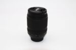 Nikon camera lens on white background, ideal for DSLR and mirrorless cameras.