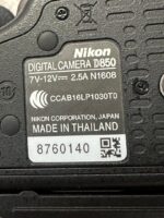Nikon D850 digital camera label showing model and manufacturing details.