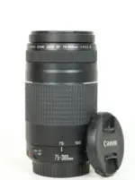 Canon EF 75-300mm zoom lens with cap, ideal for DSLR cameras and photography enthusiasts.