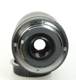 Canon camera lens with rear view, suitable for DSLR and mirrorless cameras.