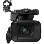 Canon professional video camera with lens and handle, available at Camix UK.