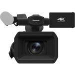 Panasonic 4K professional camcorder with lens and microphone, ideal for video production.