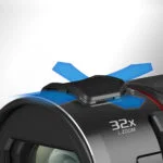 Close-up of a camcorder lens with 32x zoom feature, showcasing advanced camera technology.