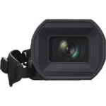 Professional camcorder with lens hood and hand strap, ideal for video production.