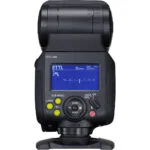 Professional camera flashgun with digital display for photography lighting.