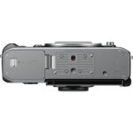 Bottom view of a mirrorless camera body showing battery compartment and tripod mount.