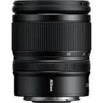 Nikon camera lens with focus and zoom rings, ideal for DSLR and mirrorless cameras.