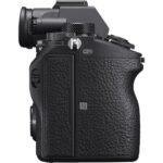 Side view of a mirrorless camera body with textured grip, available at Camix UK.