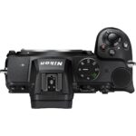 Top view of a Nikon mirrorless camera body with control dials and buttons.