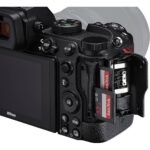 Nikon camera with dual memory card slots for SD and XQD cards, ideal for professional photography.