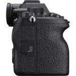 Side view of a black mirrorless camera body with textured grip, available at Camix UK.