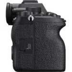 Side view of a black mirrorless camera body with textured grip, available at Camix UK.