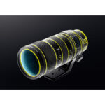 Transparent view of a camera lens showcasing internal components, ideal for photography enthusiasts.
