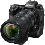 Nikon mirrorless camera with large lens, ideal for professional photography.
