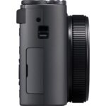 Side view of a compact mirrorless camera body available at Camix UK.