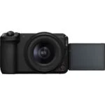 Canon mirrorless camera with flip-out screen, ideal for photography enthusiasts.