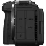 Side view of a professional DSLR camera body with various ports.