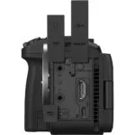 Side view of a professional camera body with open ports for HDMI, USB, and microphone connections.