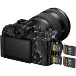 Sony mirrorless camera with lens and dual memory card slots, ideal for professional photography.