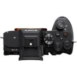 Top view of a Sony mirrorless camera body with control dials and buttons.