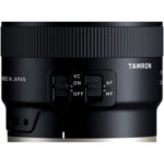 Tamron camera lens with focus and stabilization controls, ideal for photography enthusiasts.