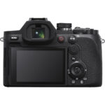 Back view of a mirrorless camera with LCD screen and control buttons, available at Camix UK.