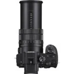 Sony mirrorless camera with telephoto lens on display at a UK camera shop.