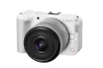 White Canon mirrorless camera with lens, ideal for photography enthusiasts in the UK.