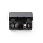 Compact camera accessory kit with multiple components in a sleek case.