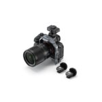 Sony mirrorless camera with lens and DJI microphone set, ideal for professional photography and videography.