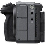 Side view of a professional mirrorless camera body with various ports and controls.