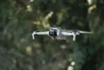 DJI Mini 3 drone flying outdoors with 4K HDR camera